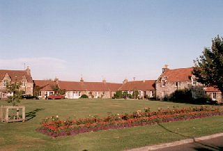 Cottages around village green, New Winton