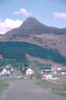 The Pap of Glen Coe rises beyond Glencoe village.