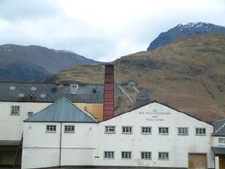The Ben Nevis Distillery and Visitor Centre, with the mountain in the background