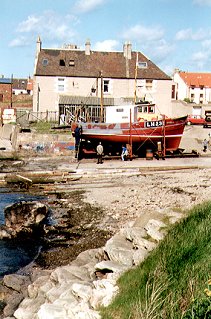 Repairing a fishing boat at Cockenzie Harbour